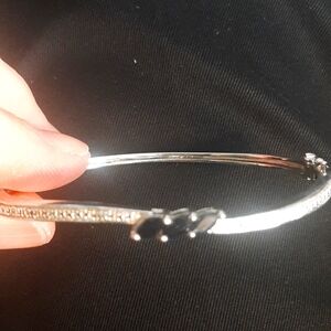 Sterling silver sapphire diamond hinged bracelet.